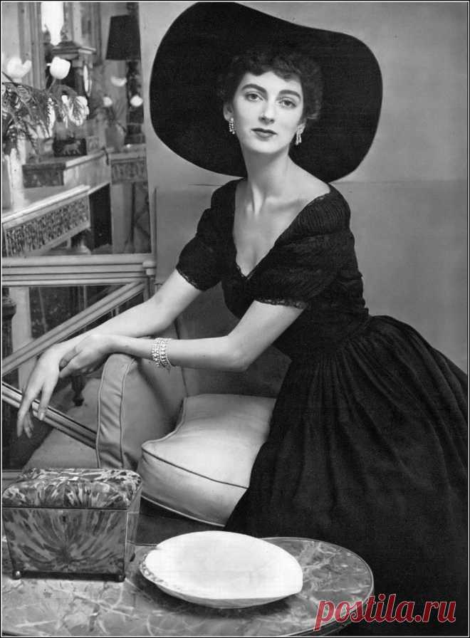 Carmen Dell' Orefice in late-day black dress of silk crêpe… | Flickr