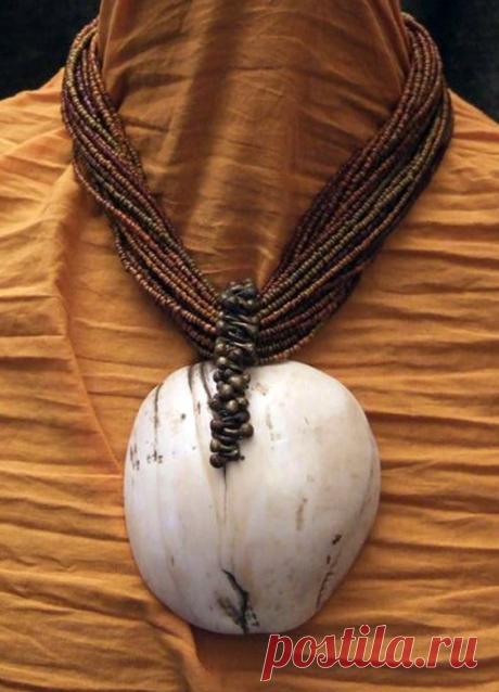 (37) Statement necklace made up of 29 rows of old Naga glass beads, and old Naga currency shell and old bronze beads from Nigeria | ©Michel Halter | Sold