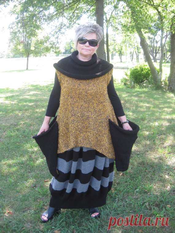 CUSTOM LISTING for ANKA.Handknitted asymmetrical sleeveless tunic/sweater with huge pockets Stunning sleeveless asymmetrical tunic/sweater made of chunky very soft yarn, in multicolored combination of mustard and gray. Decorates with huge chunky pockets and detachable black collar. Great combination with balloon striped skirt which is also available in my shop. Dimensions: the front length is 27 inches, the back is 36 inches, bust is up to 54 inches, armhole is 22 inches.