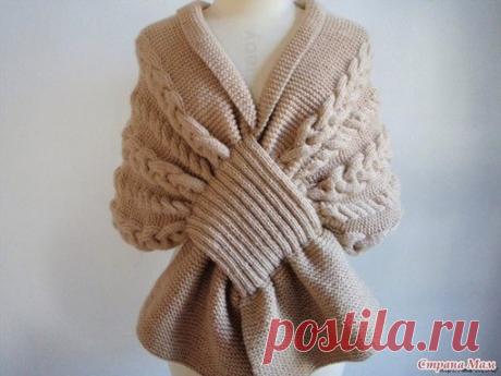 Красивый шарф - накидка.
Описание:

Чтобы связать такой красивый, оригинальный шарф, вам потребуется:
- 700г чистой овечьей шерсти
Показать полностью…