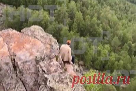 Последние секунды жизни сорвавшегося со скалы россиянина попали на видео