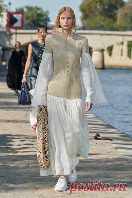 Image may contain Clothing Apparel Footwear Shoe Human Person Sleeve Evening Dress Fashion Gown and Robe
