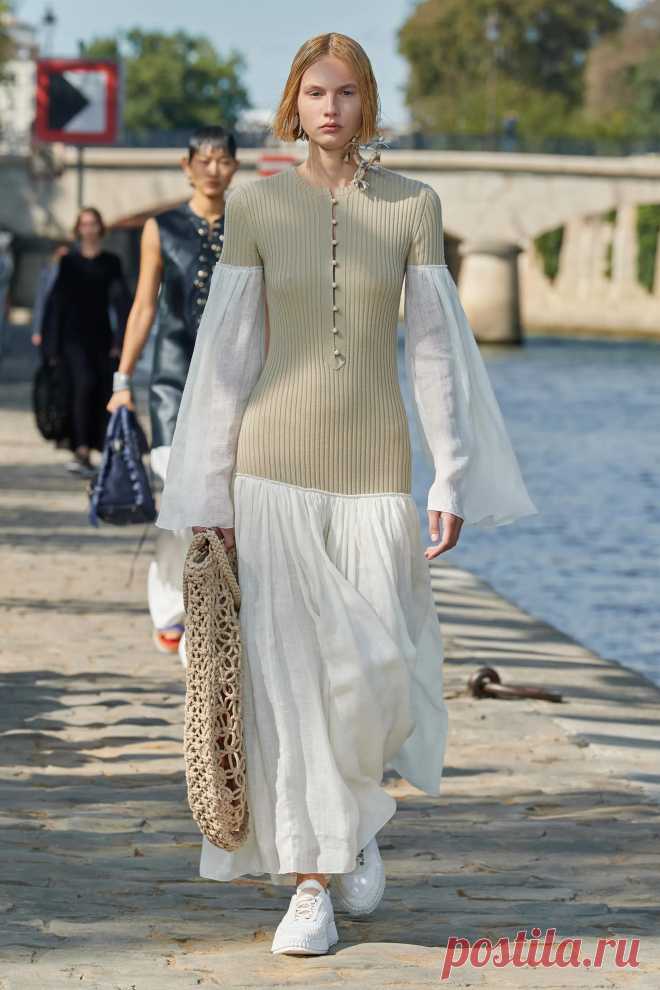 Image may contain Clothing Apparel Footwear Shoe Human Person Sleeve Evening Dress Fashion Gown and Robe