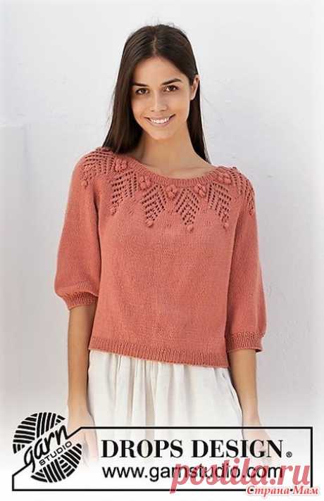 Джемпер Copper Rose от DROPS Design. Спицы. Вязаный джемпер из пряжи DROPS Safran. Изделие связано сверху вниз с круглой кокеткой, регланом и ажурным узором на кокетке, а также рукавами длиной ¾. Размеры XS–XXL.