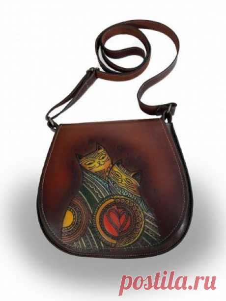 Handbag leather, author's handmade. With a picture of a cat.Size 27/21 centimeters Leather handbag, authors manual work. With a replaceable valve. With a picture of a cat.Leather handbag, authors manual work. With a replaceable valve. With the drawing of the cat. The handbag of handmade work. The drawing was made by an airbrush. Excellent quality.Size 27/21 centimeters