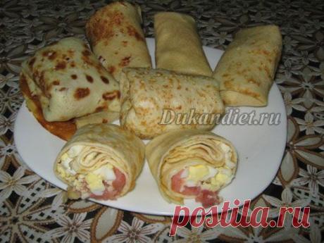 Блины на кефире без отрубей | Диета Дюкана

Яйцо - 1 шт.,
кефир или йогурт (0%) - 2 ст. л.,
кукурузный крахмал - 1 ст. л.,
сах.зам и соль по вкусу.

Все ингредиенты тщательно смешиваем, разогреваем сковородку с антипригарным покрытием и выпекаем блинчики.

Для начинки можно использовать отварные яйца и мелко порезанную соленую форель.