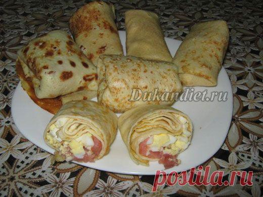 Блины на кефире без отрубей | Диета Дюкана

Яйцо - 1 шт.,
кефир или йогурт (0%) - 2 ст. л.,
кукурузный крахмал - 1 ст. л.,
сах.зам и соль по вкусу.

Все ингредиенты тщательно смешиваем, разогреваем сковородку с антипригарным покрытием и выпекаем блинчики.

Для начинки можно использовать отварные яйца и мелко порезанную соленую форель.