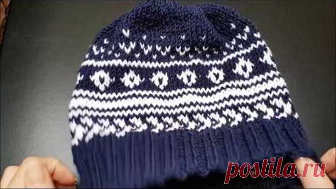 Мужская шапка спицами с жаккардом от Drops Design.