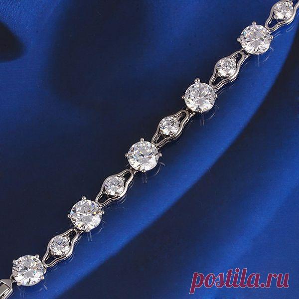 покрытие родием , вставки синтетические цирконы.