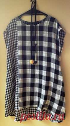 Burda pattern 8220 made with reversible cotton gingham.   Love it but not so easy matching the checks when sewing!
