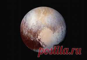 Nasa releases new photographs from Pluto fly-by – in pictures | Science | The Guardian