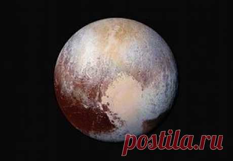 Nasa releases new photographs from Pluto fly-by – in pictures | Science | The Guardian