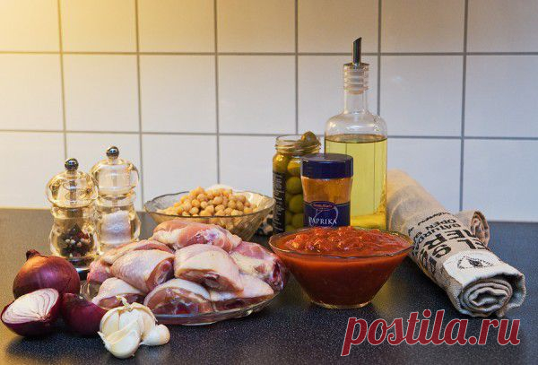 Куриные окорочка с нутом и оливками, по-испански | Четыре вкуса