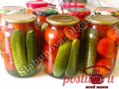 Маринованные помидоры с огурцами в сладком маринаде удивят вас своим мягким вкусом. Овощи отлично дополнят любое блюдо и порадуют вас своим вкусом.