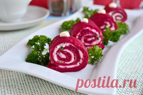 Свекольные блинчики с сыром и зеленью Оладьи, блины, блинчики - одно из самых популярных блюд во многих странах, но особенно его любят у нас. Предлагаю вам приготовить не просто блинчики, а необычные - свекольные, с начинкой из сыра и зелени. Подать эти блинчики можно в качестве закуски на любой праздничный стол и в виде рулетиков выглядят они очень красиво и эффектно. Вкус этого блюда потрясающий. Чуть сладковатые от свеклы, с ароматом чеснока блинчики и сырная начинка - ...