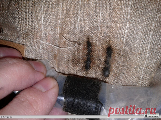 Раздвинули ткань электрогрелки (ткань потемнела)