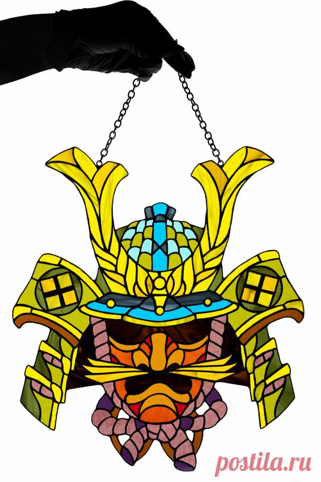 Stained glass window hanging Suncatcher Samurai face Stain glass art W Samurai face window hanging suncatcher made of stained glass pieces by my own disign.Handmade using Tiffany copper foil technique.Looks amazing in the sunlight.You will get it completely ready for installation. It comes with a self-adhesive hook and chain.It will be a great gift for friends or relatives. Width: 13 inch
