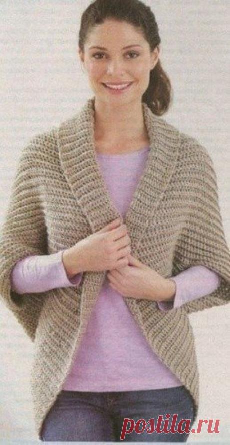 ТЕПЛЫЙ ЖАКЕТ КРЮЧКОМ
Теплый жакет оригинального фасона связан крючком. Хотя жакет связан крючком, его узор напоминает узор «английская резинка» спицами. Такой жакет вязать чрезвычайно просто, так как он представляет собой прямоугольное полотно, с прорезями для рукавов посередине. Данный жакет связан толстым крючком №6,5 из 500 грамм серой пряжи (100 грамм/200 метров). Плотность вязания составляет: 11 воздушных петель на 11 рядов получится образец 10 на 10 сантиметров. 
Наб...