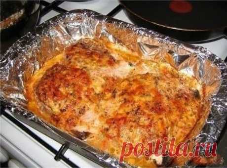 Острая свинина с сыром и грибами в духовке.