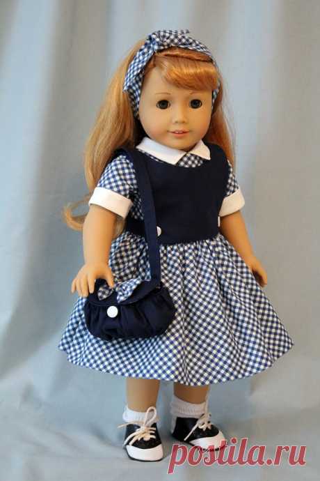 Six Piece 1950's Ensemble for Maryellen Maryellen was so excited to model her new outfit. It was inspired by a vintage pattern. It consist of the dress, plastron, belt, slip, hair tie, and purse. I made the dress from a Kindred Thread pattern and the purse from an MHD pattern. The dress fabric is a navy and off white bias print check. The plastron and purse is a navy cotton. The dress has a fitted, lined bodice with hand sewn finishes on the inside. It has an off white col...