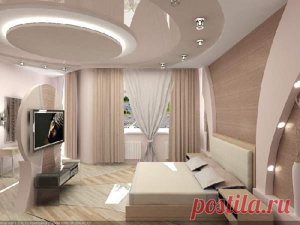 Натяжной потолок в спальне считается наиболее удачным решением для отделки. Узнайте какие современные материалы используются для такого потолка по 50 фото