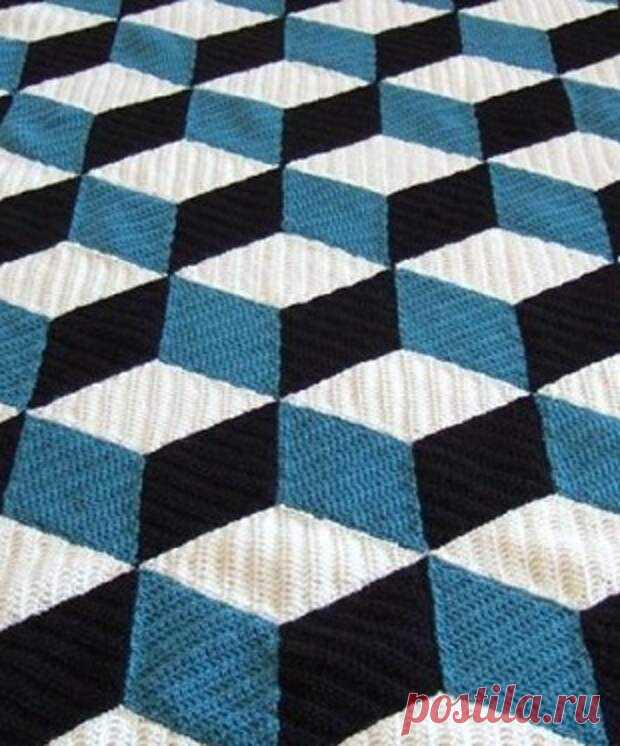 Плед с объемным узором из мотивов крючком - Домоводство - медиаплатформа МирТесен При помощи игры цветов можно создавать различные эффекты. Так например при вязании этого пледа, использовались такие умелые комбинации цветов, что создан эффект объемных кубов, расположенных в пространстве. Чтобы связать подобный плед Вам понадобится пряжа всего трех цветов: белая, синяя и черная.