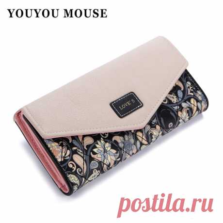 Этот женский кошелёк является воплощением функциональности и красоты. Изготовлен он из качественной экологической кожи, прошит надёжными нитками и имеет много функциональных отделов для хранения денег, кредитных карт, скидочных карт, визиток и мелочи.