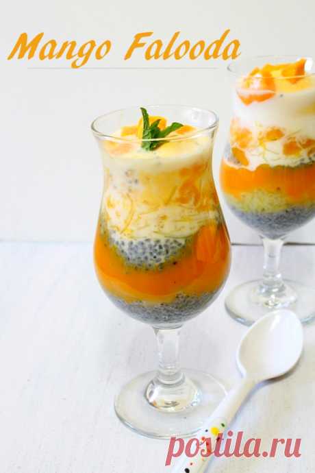 Mango falooda - layered summer beverage cum dessert made with milk, mango pulp, basil seeds, falooda sev and topped with ice cream.