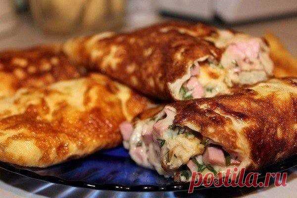 ​Омлет - рулет. Просто объедение!  
Ингредиенты на 1 рулетик: 2 яйца 
2 столовые ложки молока 
мелко тертый сыр 
мелко порезанная колбаска зелень 
 
Приготовление: 1.Хорошо взболтать яйца с молоком и вылить на разогретую сковороду. Убавить немного огонь и накрыть крышкой на пару...