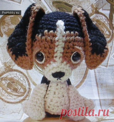 Крошка щенок
Материалы:

Пряжа (черная, белая, коричневая). Основной цвет – черный.
Крючок
Глазки
Остатки пряжи (вышить носик и ротик)

Мордочка:

7 в кольцо амигуруми
7 пр=14
(сбн, пр)*2, сбн, (сбн, пстсн) из 1, (стс1н, 2 стс1н из 1)*3, стс1н, (пстсн, стбн) из 1.
Закончить.
 

Голова (черным):
5 сбн в кольцо амигуруми
5 пр=10
(1, пр)*5=15
(2, пр)*5=20
(3, пр)*5=25
(4, пр)*5=30
(5, пр)*5=35
35:
13 (черным), 7 (коричневым), 15 (черным). Оставьте нить длиной 7-8 см.
10 (черн...