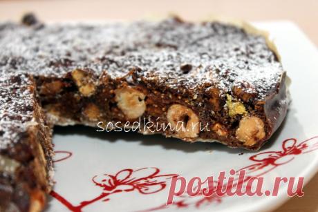 Panforte (Панфорте) — итальянский рождественский пирог из орехов и мёда.
СОСТАВ:
Миндаль — 100 гр
Фисташки — 100 гр
Фундук — 100 гр
Инжир (сушеный) — 300 гр
Мука пшеничная — 100 гр
Имбирь (молотый)
Корица (молотая)
Гвоздика (молотая)
Мёд — 80 мл
Сахар – 140 гр
Вода — 2 ст. л.
Бумага рисовая  
рецепт https://sosedkina.ru/sladkaya-vypechka/panforte-panforte-italyanskij-rozhdestvenskij-pirog-iz-orexov-i-myoda.html