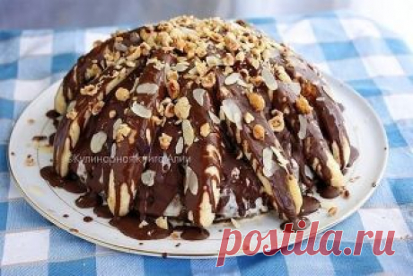 Всеми любимый ТОРТ 'ПАНЧО' - СУПЕР БАНАНОВЫЙ! Легко и безумно вкусно!

Понадобится:
Коржи:
(светлый)
1 ст. кефира
1яйцо
1 ст. сахара
1 ст. муки
1 ч.л. соды
(темный)
1 ст. кефира
1яйцо
1 ст. сахара
1 ст. муки
1 ч.л. соды
2 ст.л. какао
Начинка:
6 баночек бананового йогурта (100 граммовых)
бананы 4-5 шт
Украшение:
4-5 бананов
2 баночки бананового йогурта
шоколад 100 г + 2 ст.л. раст. масла
орехи любые для посыпки
Форма 24 см

Приготовление:

Разогрейте духовку до 180 С
В миск...