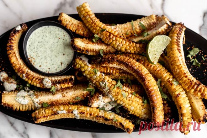 Corn Ribs Corn cobs are cut into “ribs”, then baked and seasoned with lime juice, Tajin and dipped in a creamy cilantro sauce