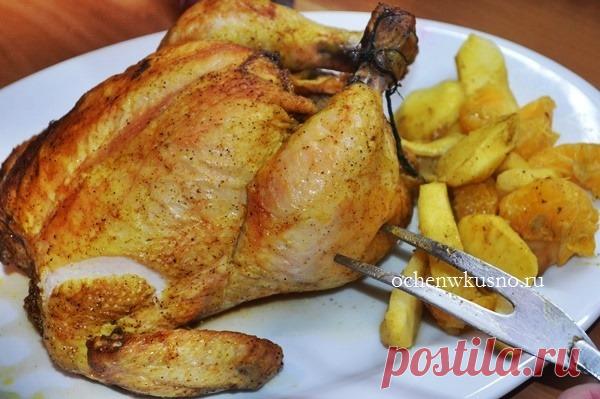 Курица запеченная целиком с мандаринами и яблоками