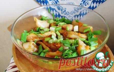 Кальмары в банке - деликатесная закуска.