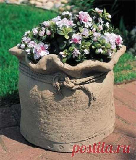 Burlap Sack Flower Planter Made of Concrete. Measures 15"Dia. x 18"H. $143.00