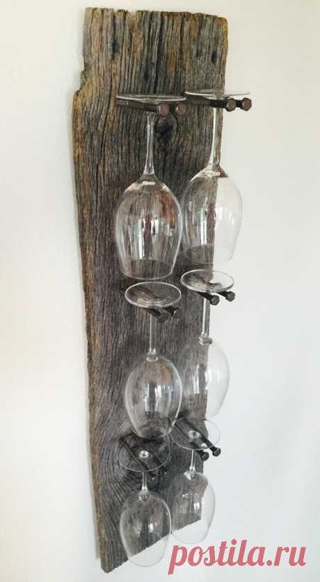 8-Glass Reclaimed Wood Industrial Wine Rack Stunning reclaimed wood wine glass rack with remarkable detail and an industrial edge. Takes any dining room or wine bar up a notch. This made-to-order, wine glass rack holds eight glasses and measures approximately 58l x 10w. Makes for a memorable housewarming gift, birthday