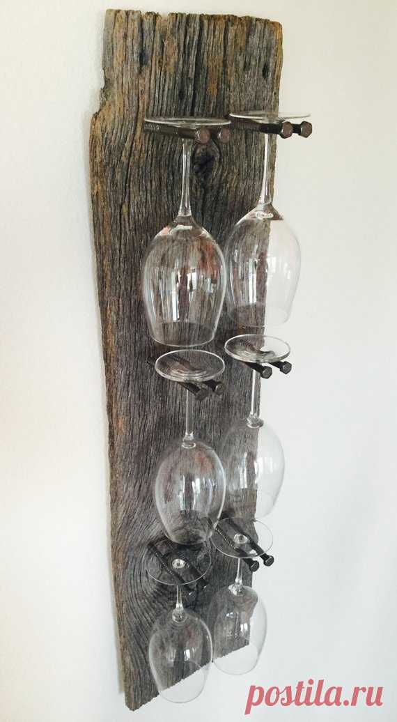 8-Glass Reclaimed Wood Industrial Wine Rack Stunning reclaimed wood wine glass rack with remarkable detail and an industrial edge. Takes any dining room or wine bar up a notch. This made-to-order, wine glass rack holds eight glasses and measures approximately 58l x 10w. Makes for a memorable housewarming gift, birthday