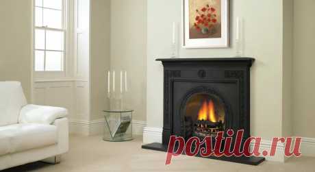 Классические камины в интерьере гостиной - фото