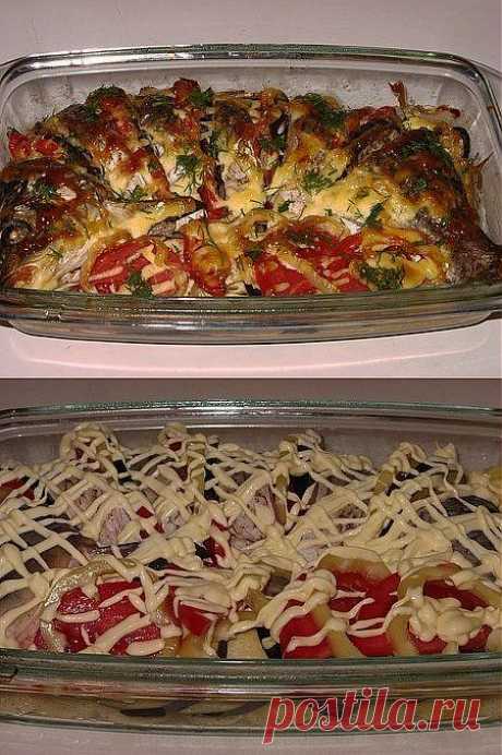 Карп, запеченный с овощами.