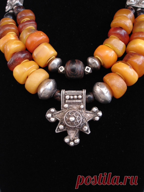 Stunning Antique Moroccan Fossil Amber, Black Coral & Silver Necklace An absolutely stunning necklace fashioned from ethnographic elements into a new designer necklace. A two strand genuine antique Moroccan natural amber and black coral necklace. This amber is not bakelite, african amber, phenolic resin or any imitation, but is real natural fossil amber which has become scarce and incredibly difficult to obtain. The colours are divine conjuring the essence of Morocco with ...