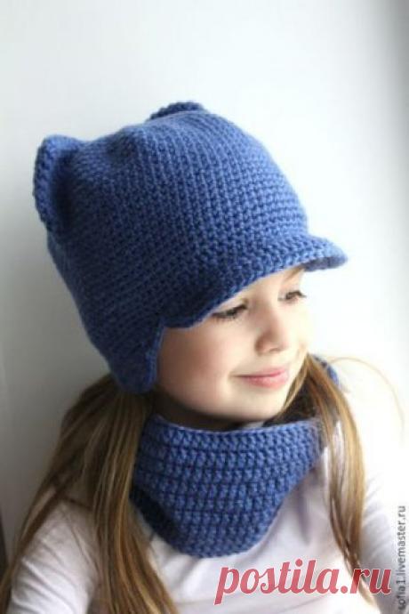 Зимняя шапочка крючком с ушками

Шапочка с кошачьими ушками нравится всем девочка без исключения. Сязанная простыми столбиками без накида, она не только красиво выглядит, но ещё и хорошо греет. Тёплая однотонная пряжа хорошо подходит для такого интересного кроя. 

 Уровень сложности: 4(5).
Показать полностью…