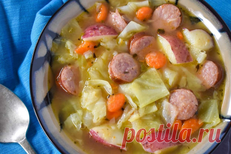 This cabbage sausage soup is hearty, easy to make and delicious. In this soup, kielbasa sausage, green cabbage, potatoes, carrots and celery are combined with herbs and spices to create a nourishing and satisfying soup.