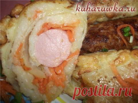 Сосиски в капустных листьях.