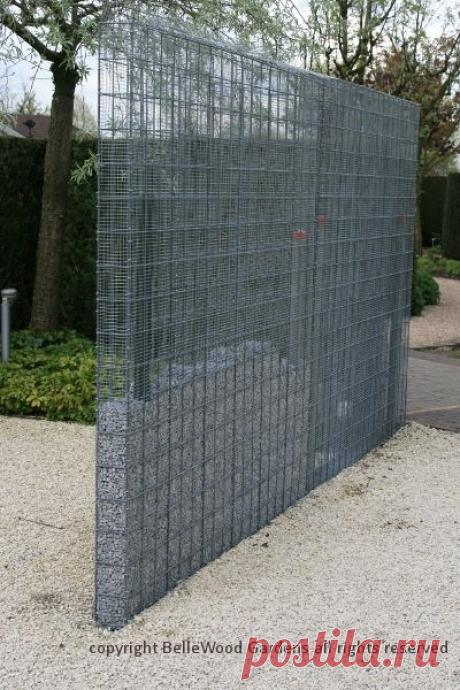 (1) Some innovative ideas on display at Appeltern Gardens, such as this hardware cloth metal mesh gabion-like fence, or perhaps it's a wall, partially …