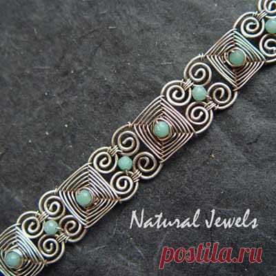 I like the way this is constructed. I can imagine this with brighter beads. Maybe one of the links for matching earrings.