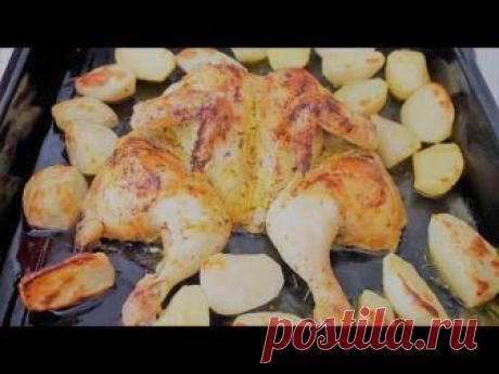 Ароматная вкусная сочная жареная в духовке курица в греческом маринаде с картошкой. Ещё похожие рецепты: самый простой способ пожарить сочную курицу https://...