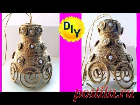 Новогодняя игрушка, ажурный колокольчик из  джута и бутылки.