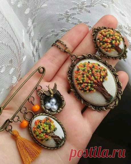 three pieces of broochies are shown in the palm of someone's hand