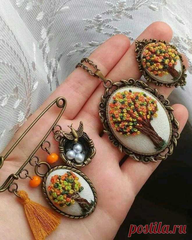 three pieces of broochies are shown in the palm of someone's hand